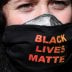 A demonstrator wearing a "Black Lives Matter" face mask is pictured after police shut down a rally that was deemed unlawful, in Sydney, Australia, July 28, 2020. REUTERS/Loren Elliott
