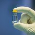 A June 24, 2020 handout photo received from biotech company IDT Biologika in Dessau-Rosslau, Germany, on July 28, 2020, shows an individual dose of the filled SARS-CoV-2 vaccine candidate. Hartmut Boesener/IDT Biologika/Handout via Reuter
