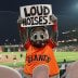 Jul 28, 2020; San Francisco, California, USA; San Francisco Giants mascot Lou Seal holds a sign reading Òloud noises!Ó during the sixth inning against the San Diego Padres at Oracle Park. Mandatory Credit: Kelley L Cox-USA TODAY Sports