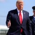 U.S. President Donald Trump gestures to members of the traveling White House press corps while walking to board Air Force One as he departs on travel to Minnesota and Wisconsin at Joint Base Andrews, Maryland, U.S., U.S., August 17, 2020. REUTERS/Tom Bren