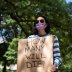 Faculty member protests in-person classes for fall semester amid the coronavirus disease (COVID-19) pandemic, outside Fleming Administrative Building at the University of Michigan campus in Ann Arbor, Michigan, U.S., August 19, 2020. REUTERS/Emily Elconin