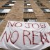 Residents of Meridian Heights apartments in Northwest Washington display a painted bedsheet protesting for the cancelation of rent due to the loss of jobs during the coronavirus disease (COVID-19) pandemic in Washington, D.C., U.S., August 20, 2020. REUTE