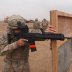 Pfc. Simeon Taylor, with Bravo Company, 427th Brigade Support Battalion, fires the German made Heckler & Koch G36 assault rifle during the qualification for the schützenschnur badge, at the German marksmanship range, on Nov. 17 in Mazare-e Sharif, Afghani