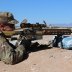 An Infantry Soldier along with 15 additional Soldiers assigned to Alpha Company, 4-17 Infantry Battalion, 1st Stryker Brigade Combat Team, 1st Armored Division, fires rounds down range with the newly developed Squad Designated Marksman Rifle (SDM-R), Jan.