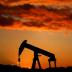 A oil pump is seen at sunset outside Scheibenhard, near Strasbourg, France, October 6, 2017 . REUTERS/Christian Hartmann