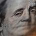 A portrait of Benjamin Franklin on a U.S. One-hundred dollar bill is pictured at Interbank Inc. money exchange in Tokyo, in this September 9, 2010 picture illustration. The dollar neared a 15-year low versus the yen on Thursday as traders bet Japanese aut