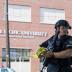 A policeman secures the scene at Seattle Pacific University after the campus was evacuated due to a shooting in Seattle, Washington June 5, 2014. A gunman opened fire on Thursday on the campus of a small Christian college in Seattle, killing one person an