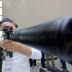 A participant holds a rifle during the annual international military-technical forum "ARMY" at Patriot Expocentre in Moscow Region, Russia August 21, 2018. REUTERS/Maxim Shemetov