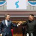 South Korean President Moon Jae-in and North Korean leader Kim Jong Un hold hands after watching the performance titled "the Glorious Country" at the May Day Stadium in Pyongyang, North Korea, September 19, 2018. Pyeongyang Press Corps/Pool via REUTERS
