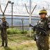 South Korean soldiers stand guard while removing landmines inside of the Demilitarized Zone (DMZ) on October 2, 2018 in Cheorwon, South Korea. Picture taken October 2, 2018. Song Kyung-Seok/Pool via REUTERS