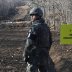 A South Korean soldier stands at the Arrowhead ridge, a site of fierce battles in the 1950-53 Korean War, to build a tactical road across the Military Demarcation Line inside the Demilitarized Zone (DMZ), in the central section of the inter-Korean border 