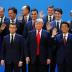 Britain's Prime Minister Theresa May, French President Emmanuel Macron, U.S. President Donald Trump, Japanese Prime Minister Shinzo Abe, Argentina's President Mauricio Macri and G20 leaders pose for a family photo during the G20 summit in Buenos Aires, Ar