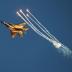 An Israeli air force F-15I fighter jet releases flares during an air force pilots' graduation ceremony at Hatzerim air base in southern Israel June 27, 2013. Some 30 cadets graduated on Thursday where they were addressed by Israel's Prime Minister Benjami