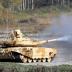 A Russian T-90 tank fires during the "Russia Arms Expo 2013" 9th international exhibition of arms, military equipment and ammunition, in the Urals city of Nizhny Tagil, September 25, 2013. REUTERS/Sergei Karpukhin (RUSSIA - Tags: MILITARY)