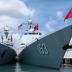 Chinese Peoples Liberation Army Naval Frigate Hengshui (L) is moored next to the PLAN ship Xi'an after arriving at the Joint Base Pearl Harbor Hickam to participate in the multi-national military exercise RIMPAC in Honolulu, Hawaii, June 29, 2016.