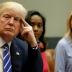 U.S. President Donald Trump (L), flanked by Johnson Security Bureau President Jessica Johnson and his daughter Ivanka Trump, meets with women small business owners at the White House in Washington, U.S. March 27, 2017. REUTERS/Jonathan Ernst TPX IMAGES OF