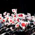 Well-wishers wave Japanese national flags as Japan's Emperor Akihito (not pictured) appears on a balcony of the Imperial Palace during a public appearance for New Year celebrations at the Imperial Palace in Tokyo, Japan, January 2, 2018. REUTERS/Toru Hana