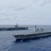 The Navy's forward-deployed aircraft carrier USS Ronald Reagan operates with the Japan Maritime Self-Defense Force helicopter carrier JS Izumo (R) in South China Sea June 11, 2019. Picture taken June 11, 2019. Courtesy JMSDF/U.S. Navy/Handout via REUTERS