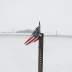 An American flag sits on a pole outside a campaign event for Democratic 2020 U.S. presidential candidate and former U.S. Vice President Joe Biden at the VFW Post 7920 in Osage, Iowa, U.S., January 22, 2020. REUTERS/Shannon Stapleton