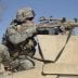 U.S. Army Sgt. Colin Cleek, from Reconnaissance Platoon, 2nd Battalion, 508th Parachute Infantry Regiment, looks through the scope of his rifle onto a mortar range near Ghazni, Afghanistan, on April 1, 2007.   DoD photo by Staff Sgt. Michael L. Casteel, U