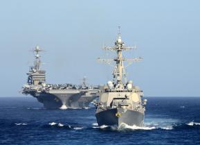 PACIFIC OCEAN (Aug. 4, 2015) The guided-missile destroyer USS William P. Lawrence (DDG 110), front, leads the aircraft carrier USS John C. Stennis (CVN 74) in a show of force transit off the coast of San Clemente Island near Southern California.